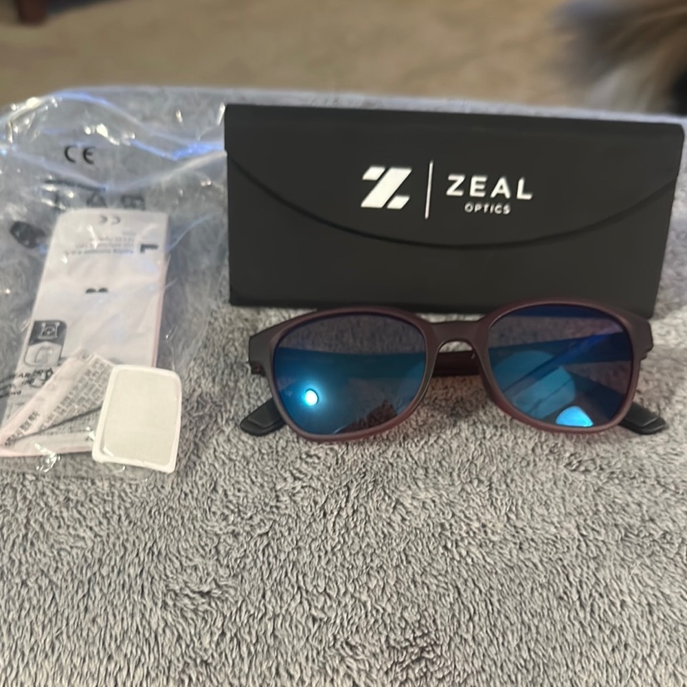 Zeal Optics Sunglasses with Blue Mirror Lenses